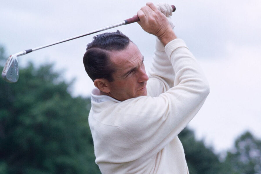 Dow Finsterwald swinging a golf club.