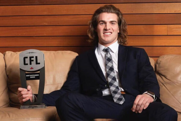 Dalton Schoen poses with his Most Outstanding Rookie Award.