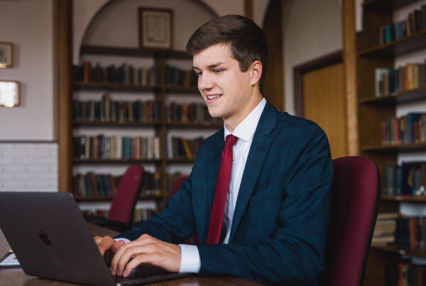 Trent Hoekstra works on his laptop.
