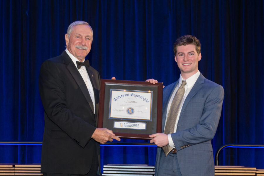 Colin Burnett, Georgia Tech '23, receives his award for being selected for the Astronaut Scholarship from astronaut and ASF Chairman Curt Brown.